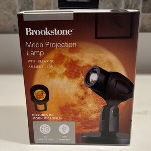 Brookstone Lunar LED Projector in Black and Orange